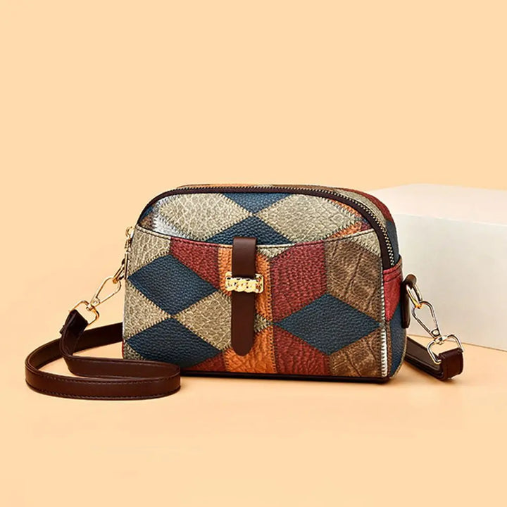 Avelia multicolor leather mini crossbody bag with diamond patchwork pattern and front buckle accent