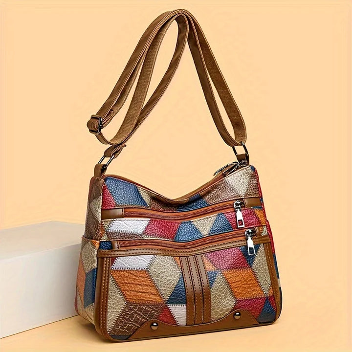 Model wearing Avelia multicolor leather shoulder bag crossbody